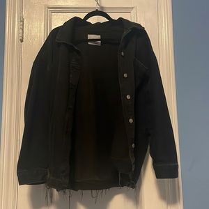 Black denim coat. Frayed ends.